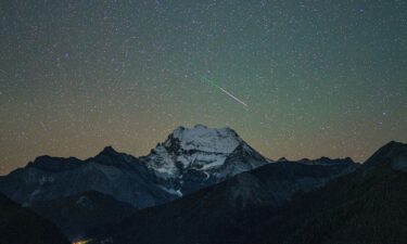 The Orionid meteor shower can be seen over the Yading Nature Reserve in southwest China's Sichuan province in October 2025.