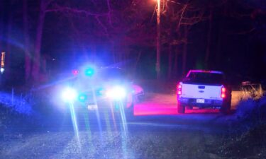 Law enforcement vehicles at a shooting scene in Osage County on Feb. 13